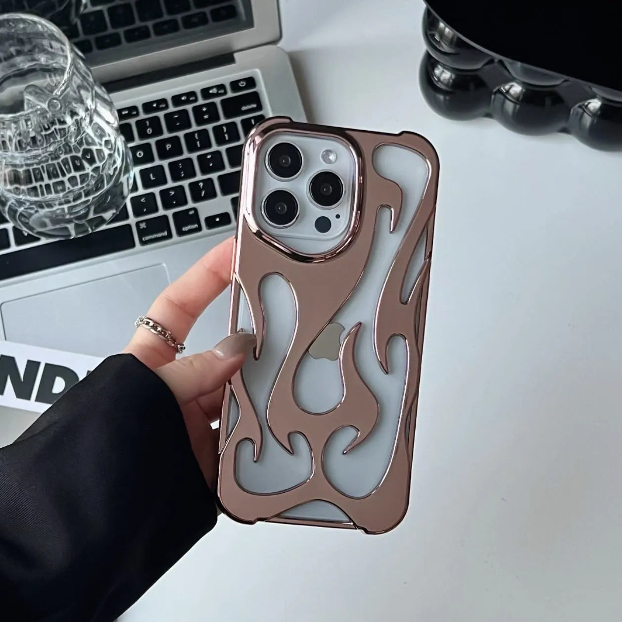 Electroplated hollow flame pattern iPhone case in silver with TPU soft shell construction