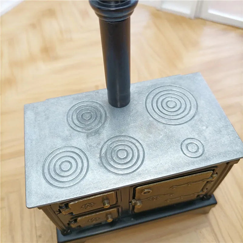 Brown wrought iron miniature stove for doll house kitchen scene, 0.9cm width
