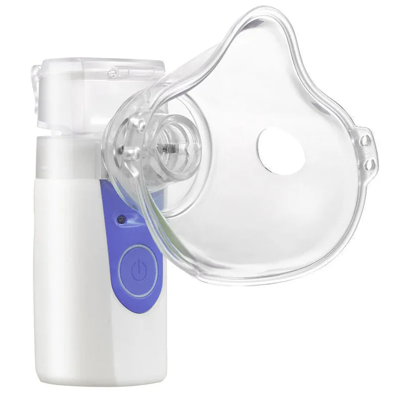 Handheld columnar plastic nebuliser with USB cable for humidification and drug atomisation.