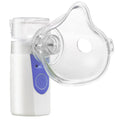 Handheld columnar plastic nebuliser with USB cable for humidification and drug atomisation.
