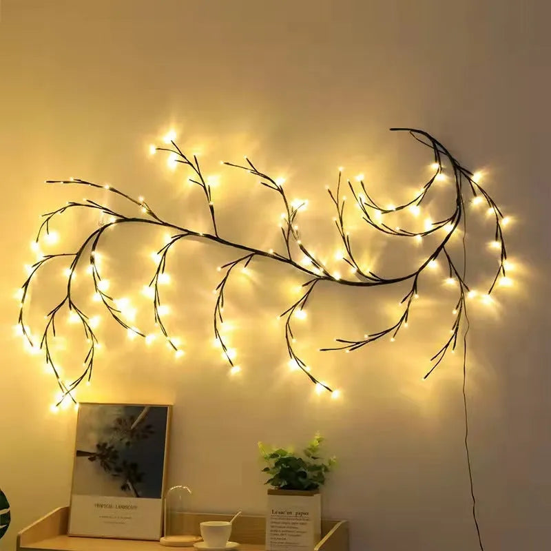 Flexible LED vine light garland with warm white lights on textured birch-bark branches, shaped decoratively.