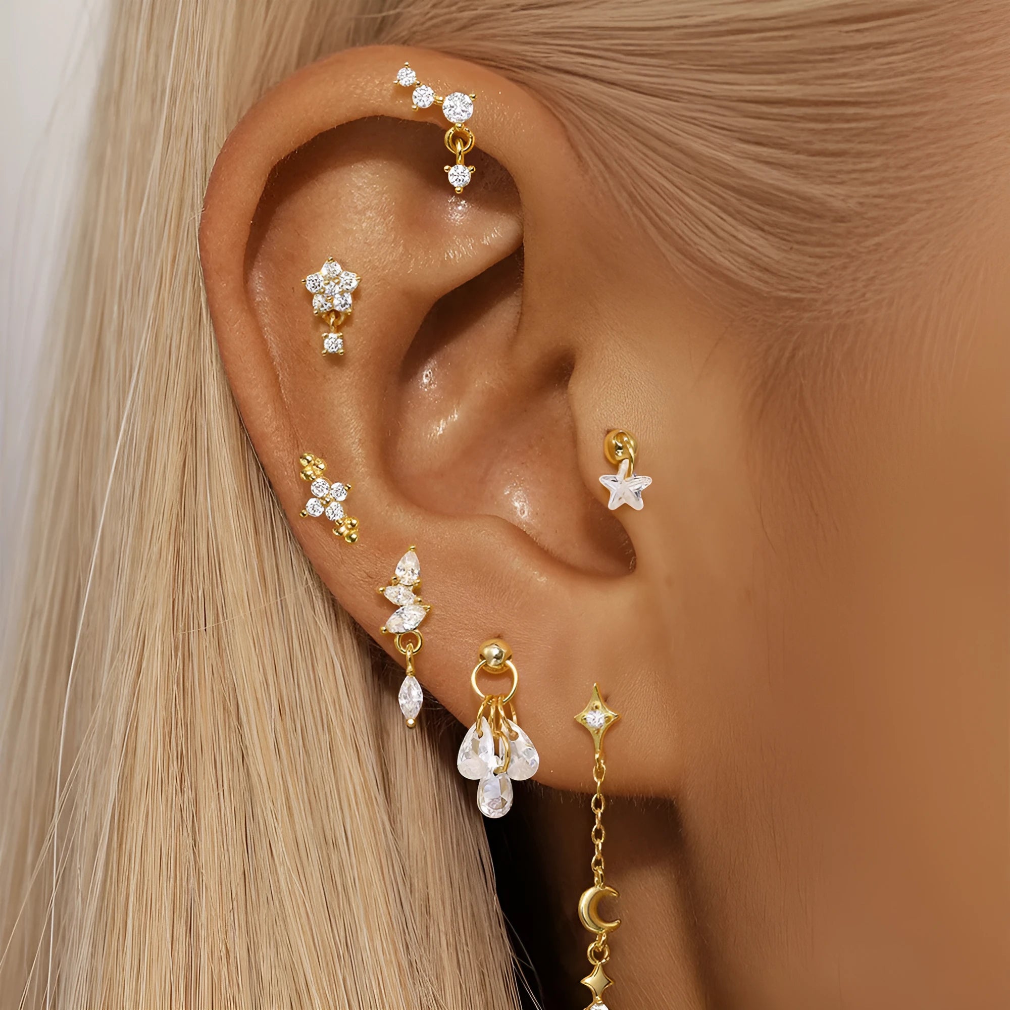 S925 sterling silver geometric moon and star earrings with cubic zirconia stones in a gold tone finish.