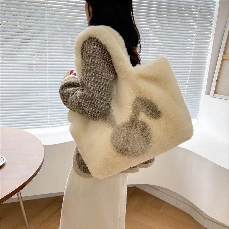 Plush shoulder bag with cartoon rabbit ears design in solid colour options