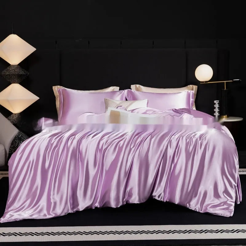 Silk bed sheet four-piece set in solid colour folded, showing options for Ash Purple, Cool Black, and Golden Camel.