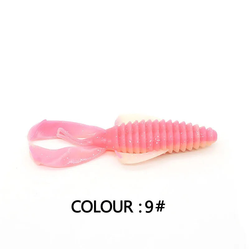 8cm PVC fishing soft bait lure in multiple colour variations against fishing tackle background