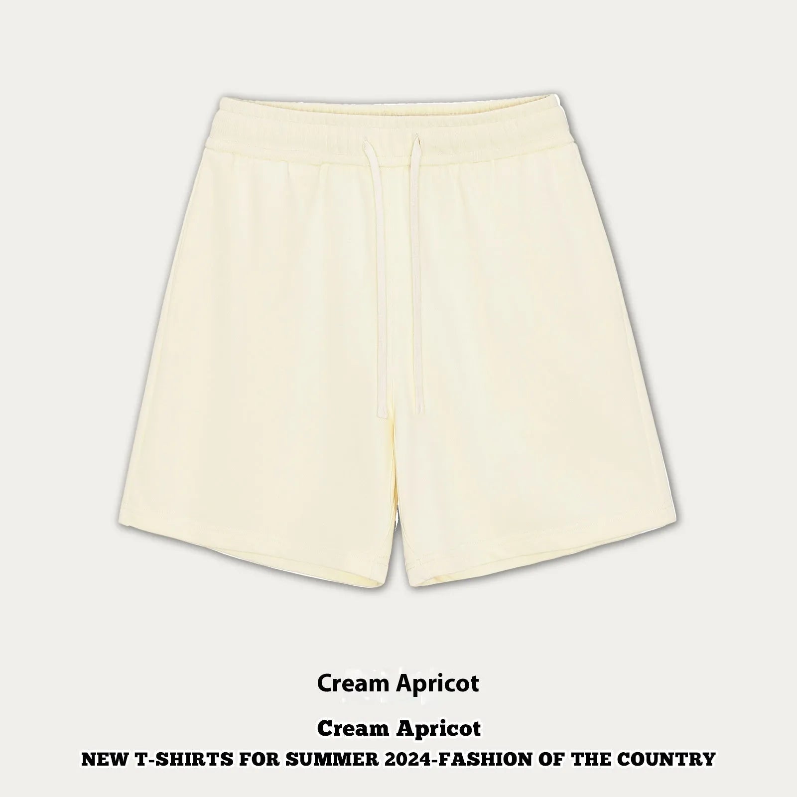 Baby boy and girl wearing loose-fitting cotton denim shorts in cream apricot colour.