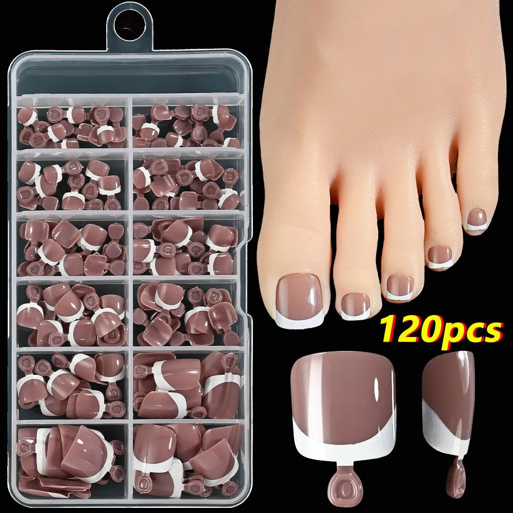 Open box showing 120 French white tip nude square false toe nails in assorted shades.