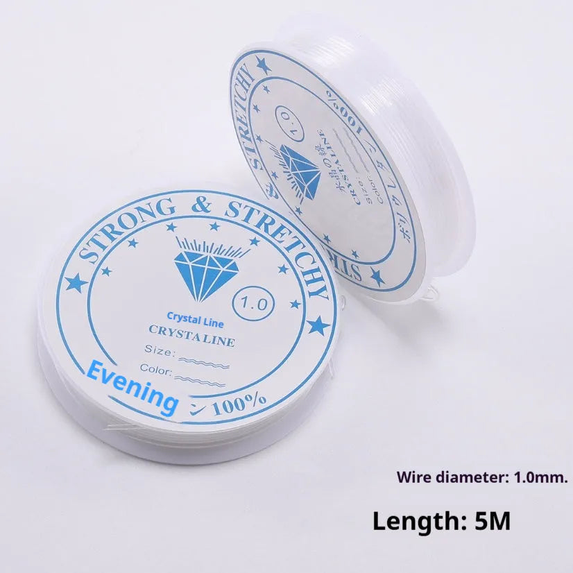 Clear white elastic fishing line on a reel for jewellery making and DIY crafts