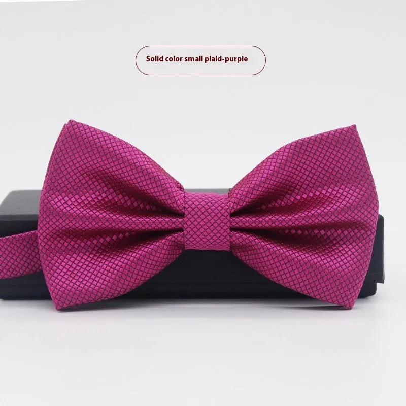 Men's flat head style polyester bow tie in a solid colour, shown with adjustable neck strap.
