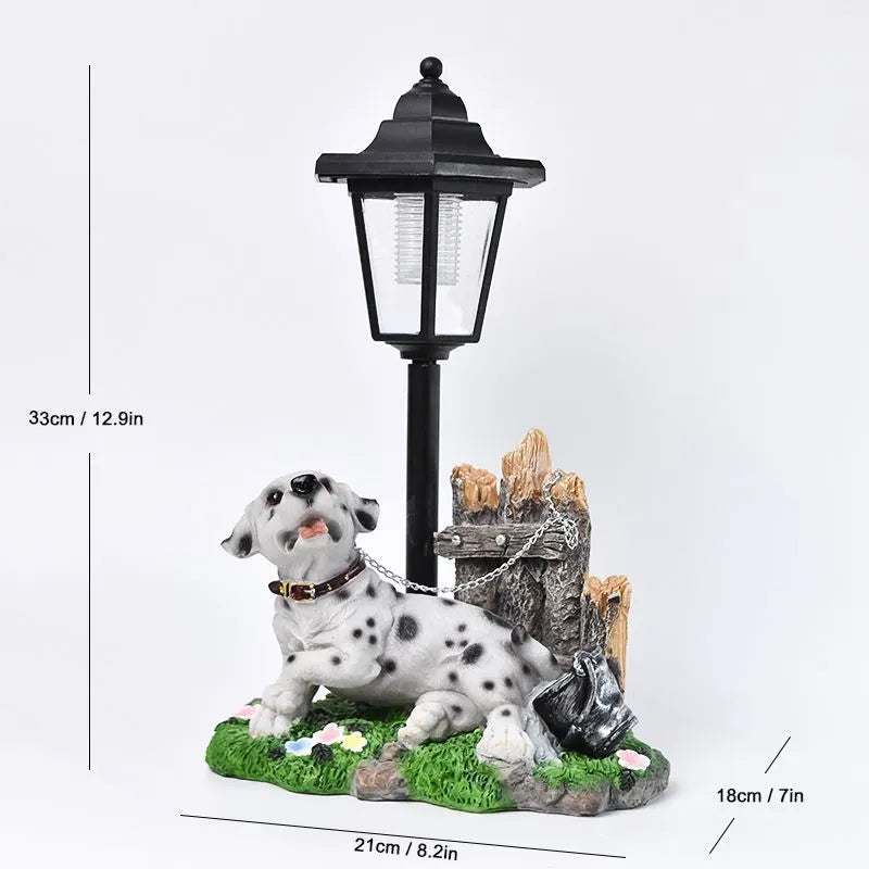 Solar hexagonal garden lamp with decorative resin figurine on plastic base for outdoor pathway lighting
