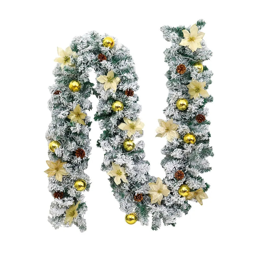 PVC Christmas rattan garland with flocked decoration in golden colour, draped to show texture and length.