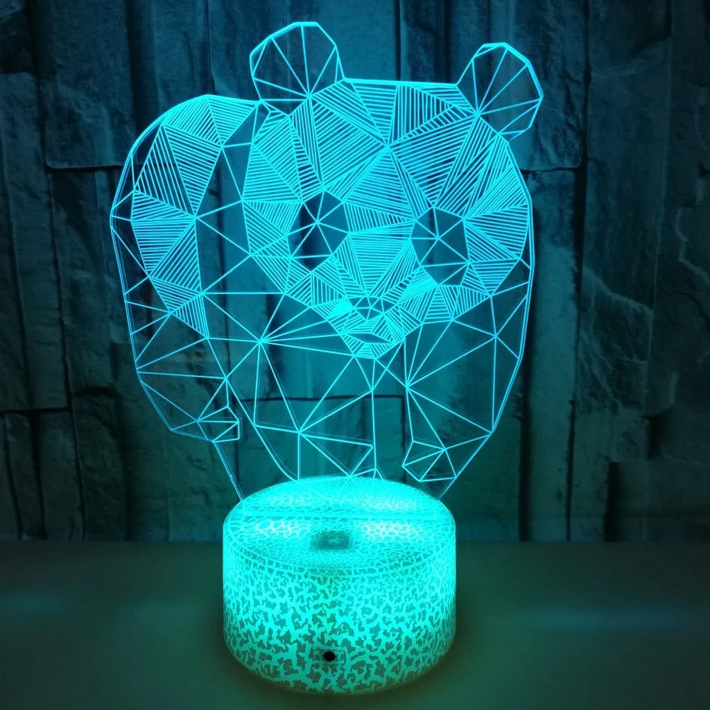 Panda colorful LED 3D night light with remote control showing seven colour gradient on a bedroom shelf