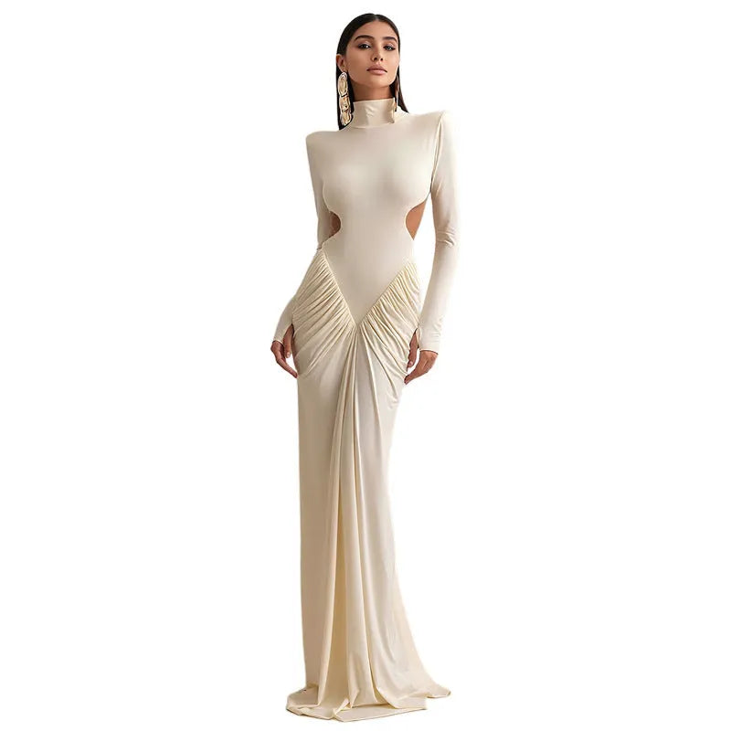 Long sleeve high collar slim fit pleated backless dress in a solid colour on a model.