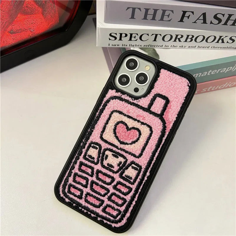 Pink towel embroidered TPU phone case for iPhone showing textured back surface and camera cutouts