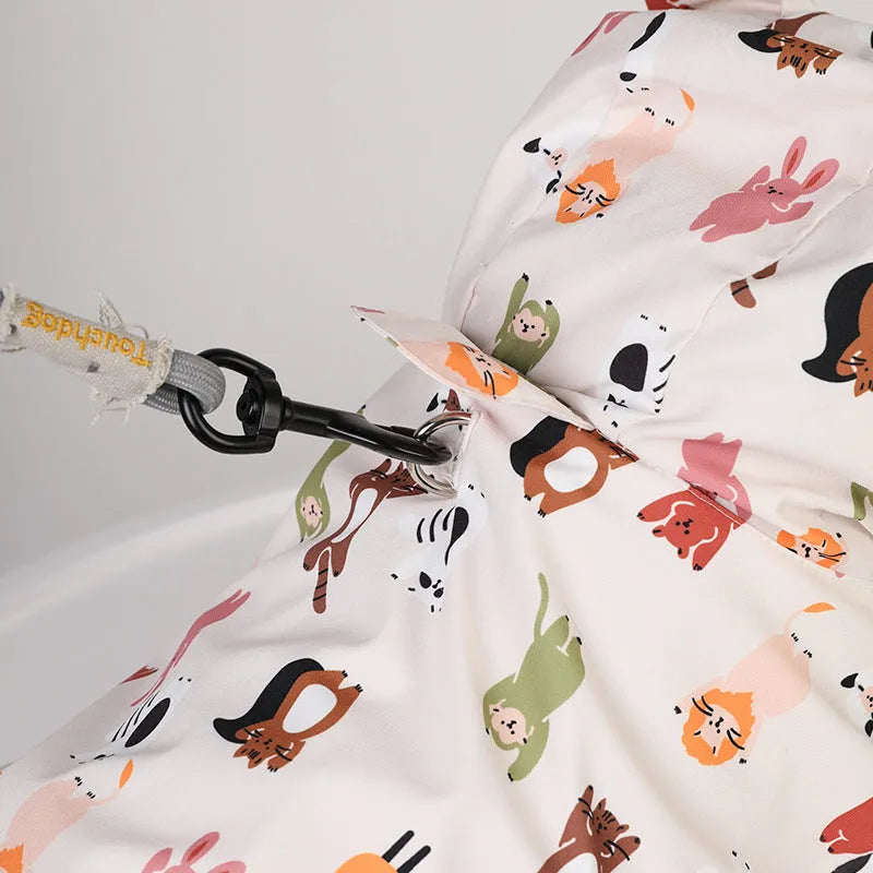 Beige dog raincoat with cartoon animal pattern waterproof PU material