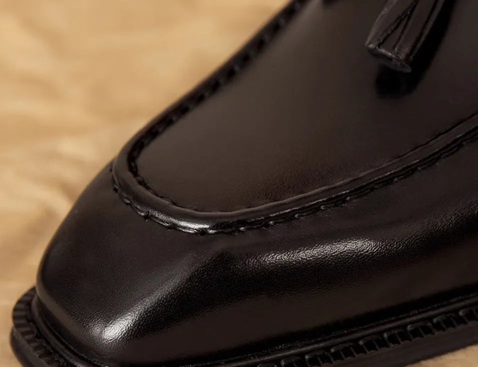 Men's black genuine leather loafers with fringed design and rubber soles