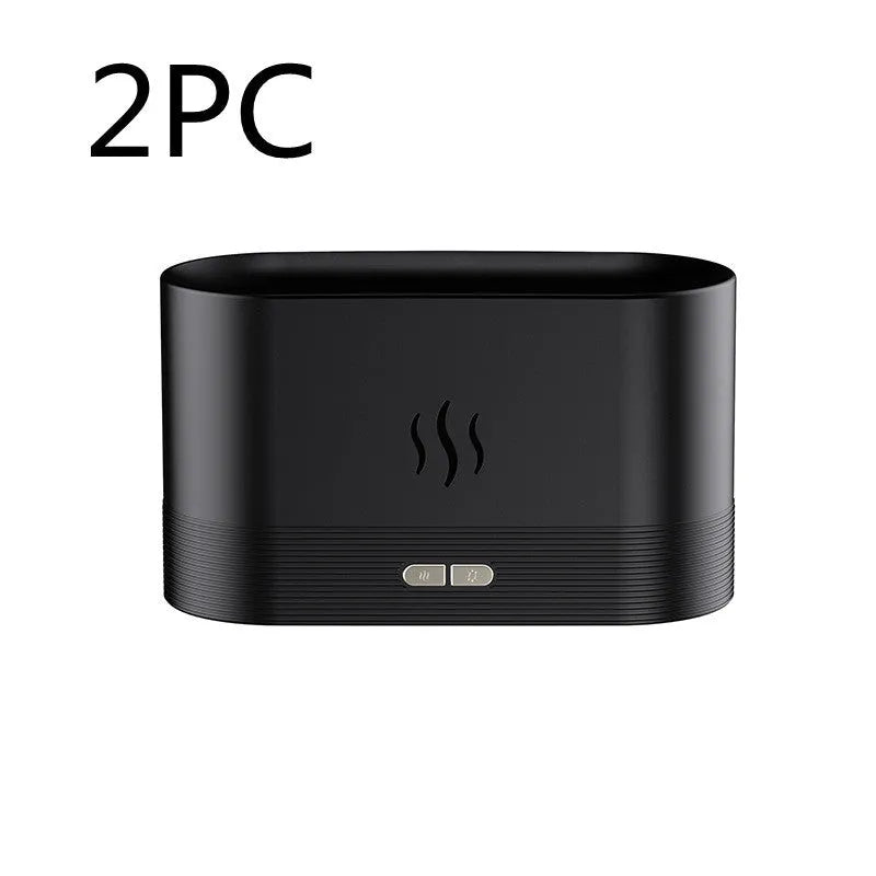 Square 180ml ultrasonic aroma diffuser with flame LED light in black, on a desk with visible mist