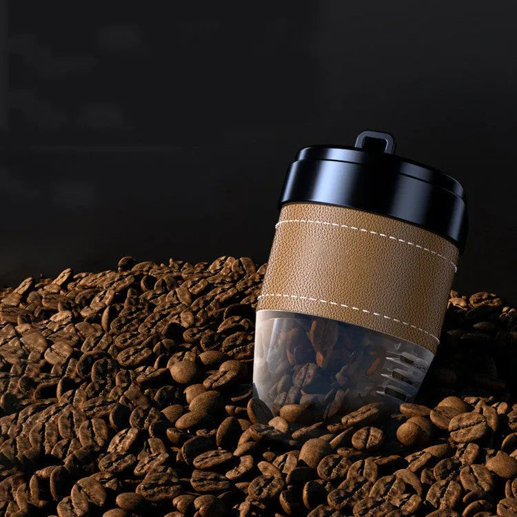 Solid coffee bean car air freshener shaped like a coffee cup on a car dashboard.