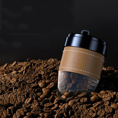Solid coffee bean car air freshener shaped like a coffee cup on a car dashboard.