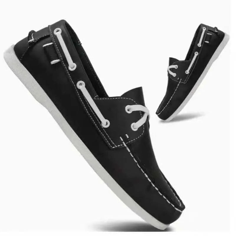 Men's black casual Oxford-style shoes with artificial PU leather upper and flat heel on a white background.