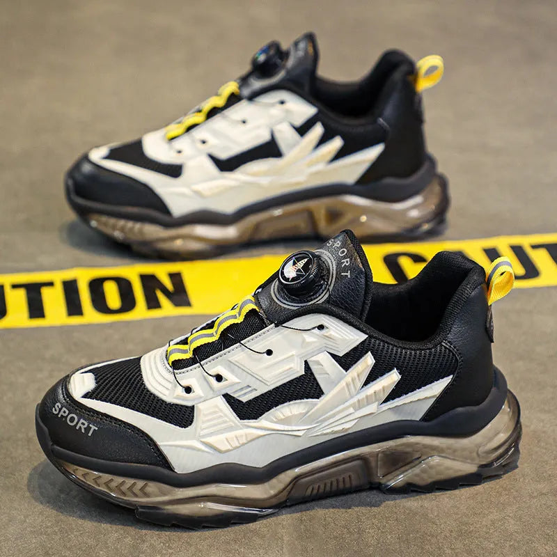 Men's black mesh sneakers with a rotating button on the side and a thick platform sole.