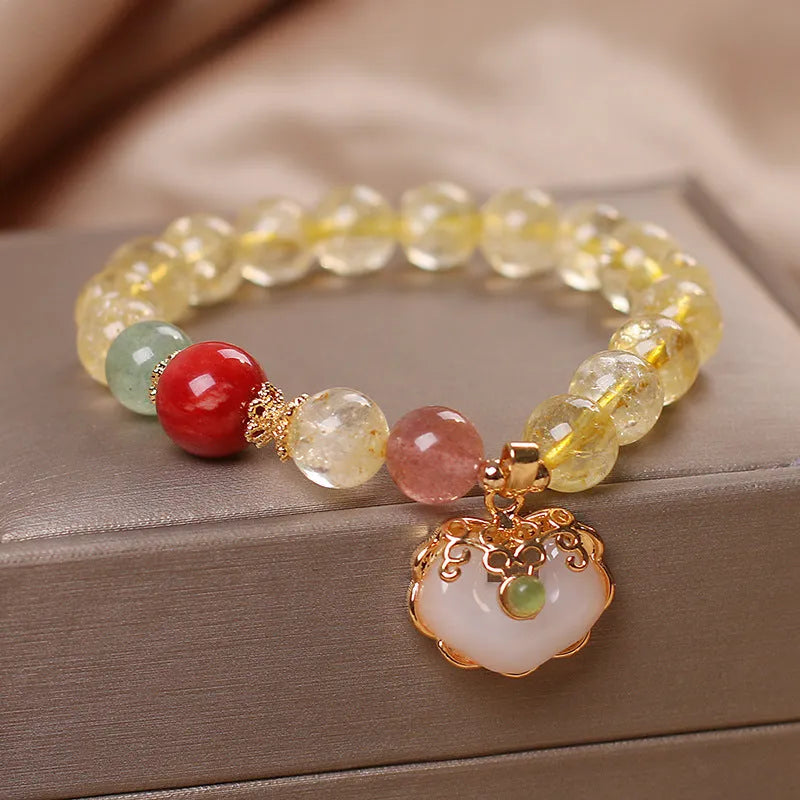 Women's alloy bracelet with a yellow citrine jade ruyi pendant in an original design.