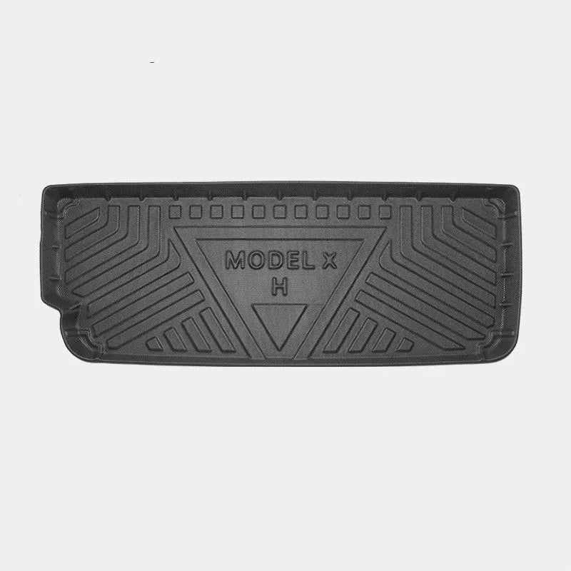 Rubber floor mat set for Tesla Model X showing foot pads and tailbox cushion for interior protection