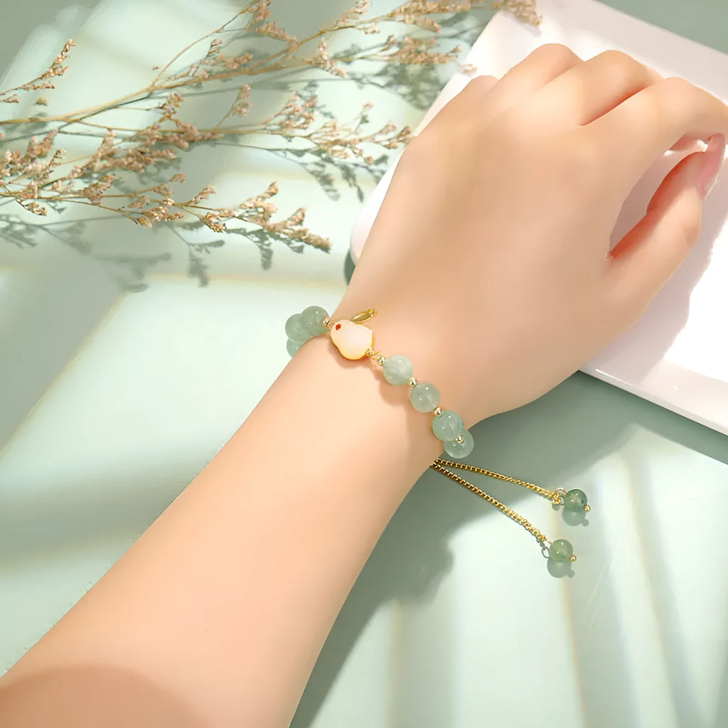 Rabbit charm bracelet with green aventurine or strawberry quartz stones on gold-plated copper