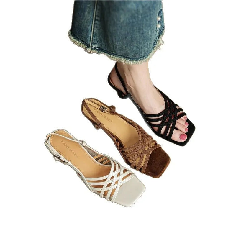 Women's light brown retro ankle-strap sandals with thin cross straps and a square toe on a mid heel.