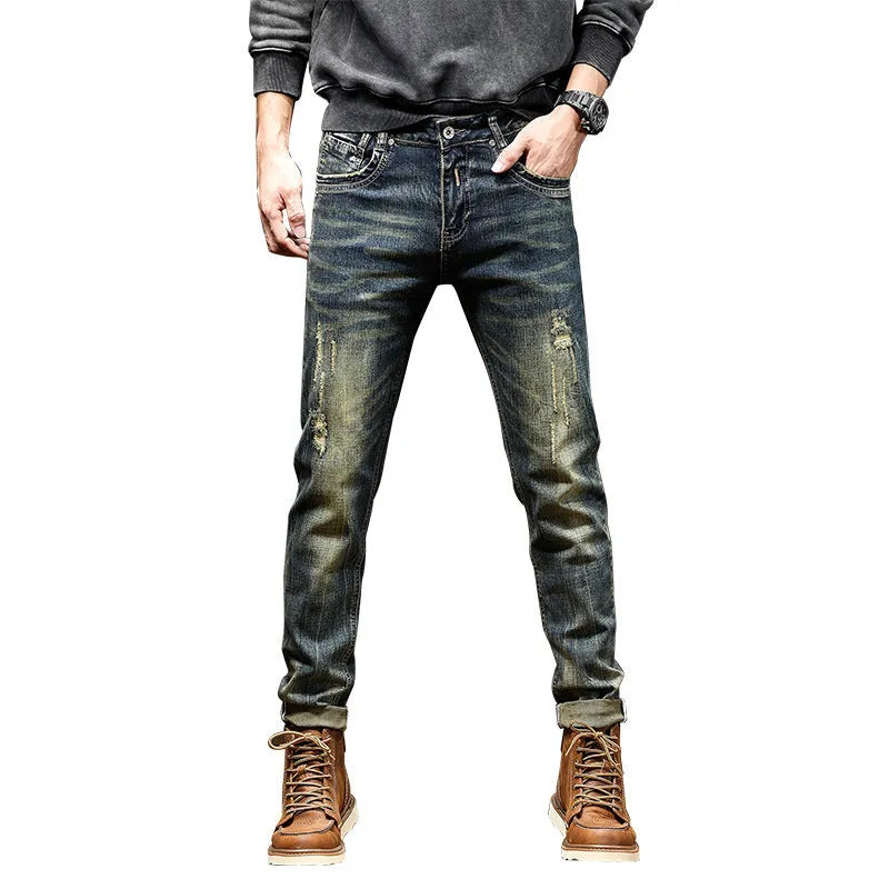 Men's skinny fit retro colour jeans with a zip fly, laid flat.