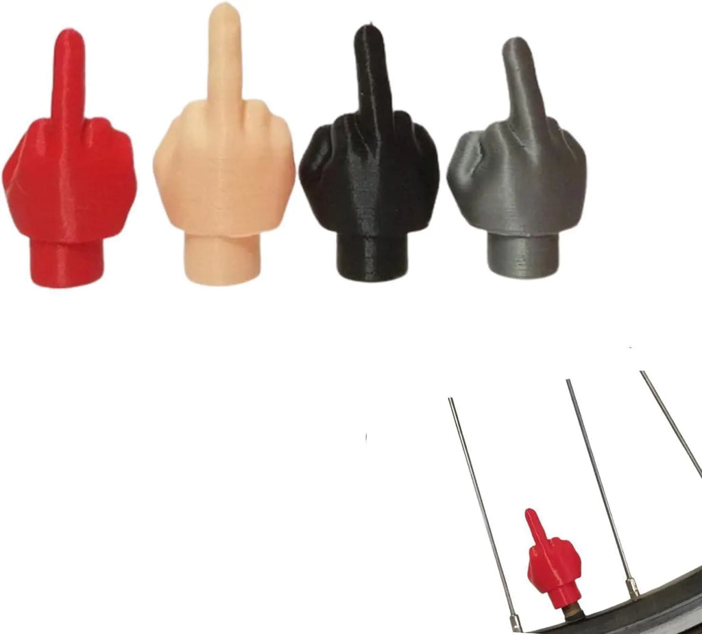 Four latex tyre valve dust caps showing black and skin colour pieces for car wheel valve protection