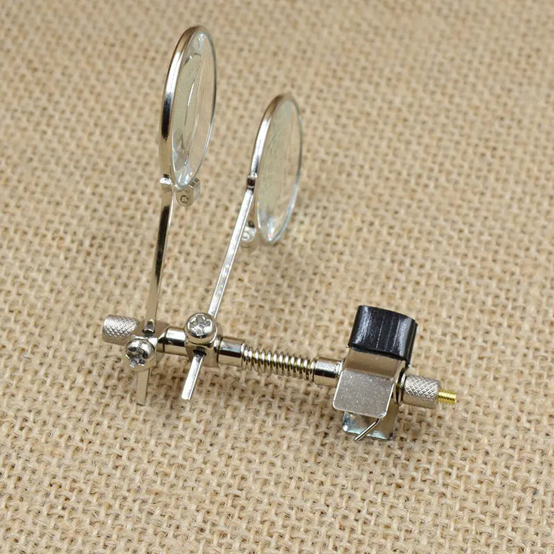Auxiliary reading glasses clip with metal bracket and glass lenses for adding magnification to eyewear