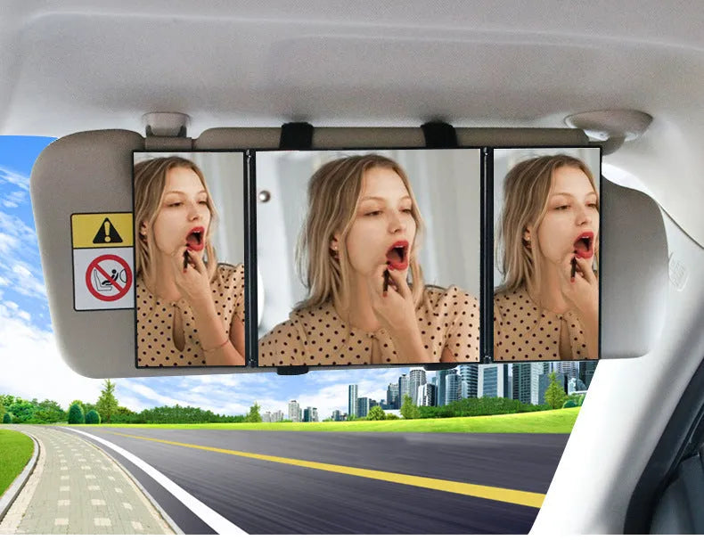 Silver folding car makeup mirror shown open and closed, next to a car visor.