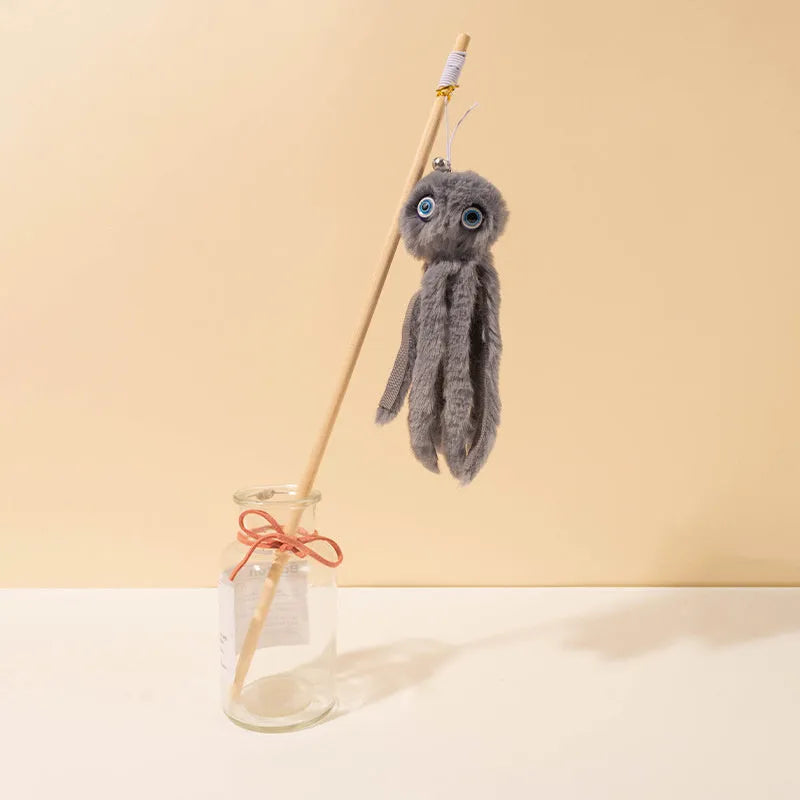Furry octopus cat toy with eyes on 40cm long stick in pink colour for kitten play