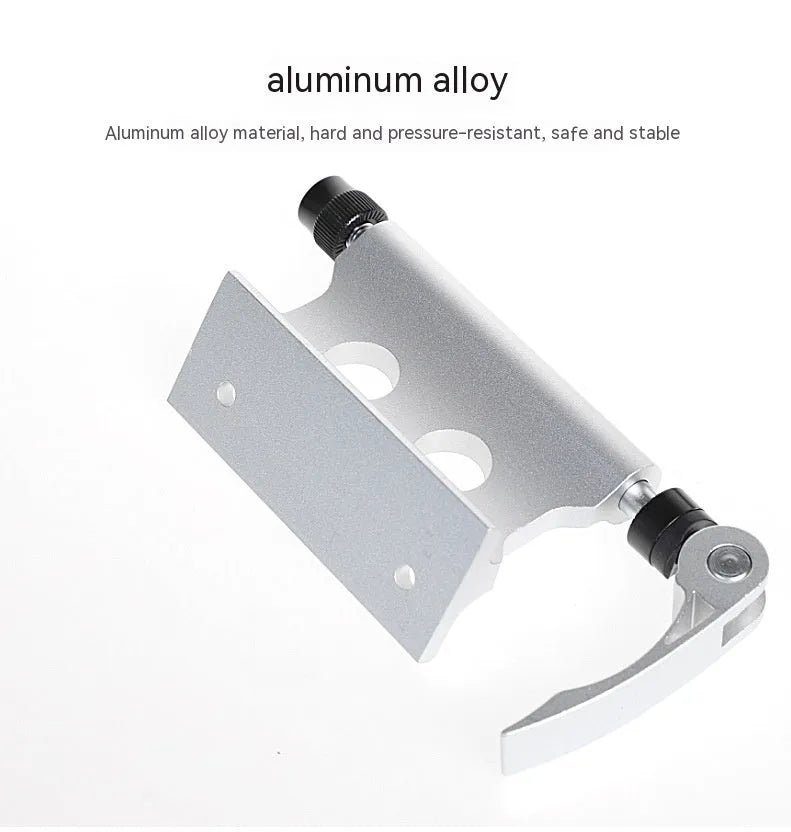 Silver metal quick release fixing clamp for a bicycle front fork.