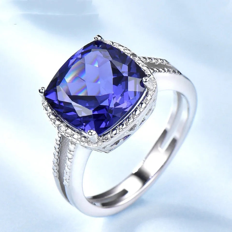 Women's sterling silver ring with blue tanzanite stone in sizes 6 to 10