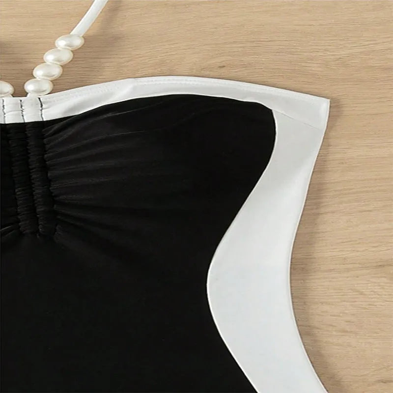 Women's black or white one-piece swimsuit with pearl spaghetti straps for swimming
