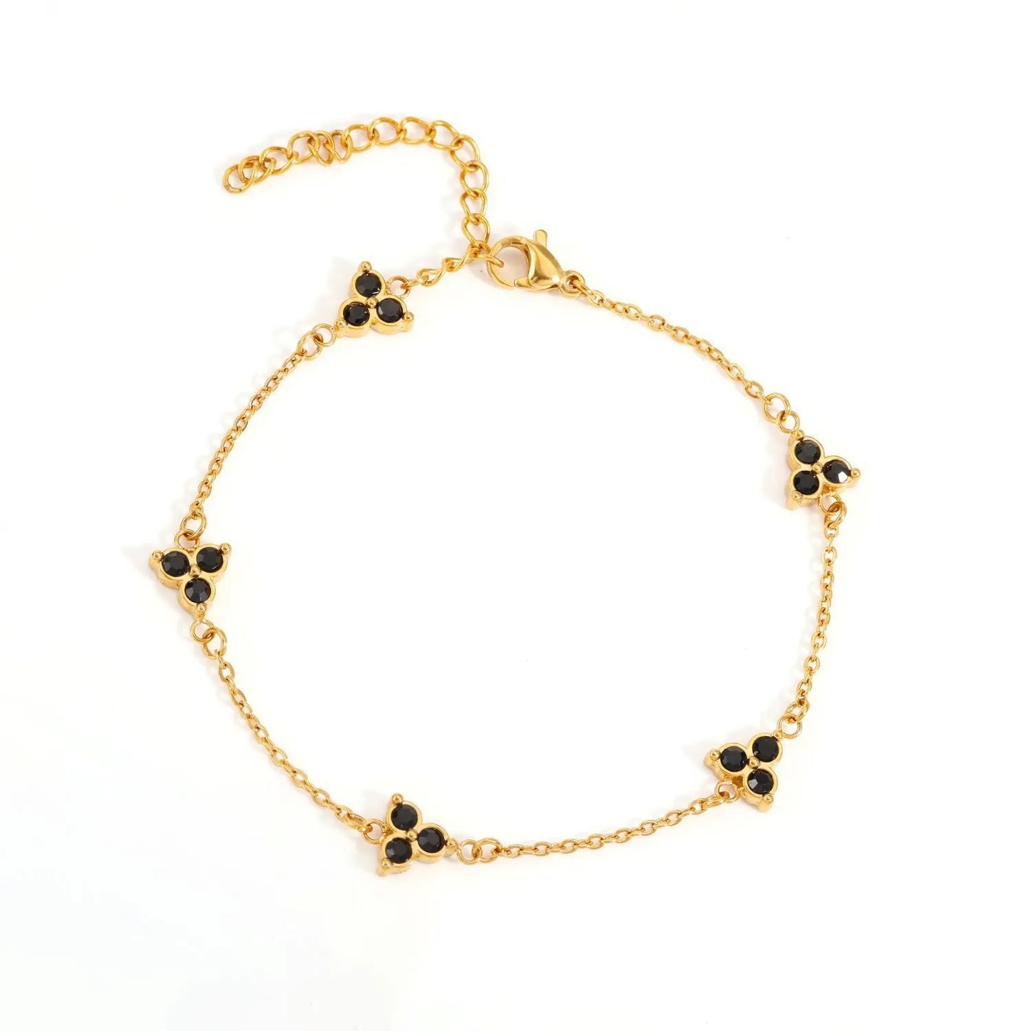 Women's stainless steel geometric bracelet with triangle elements and coloured stone settings