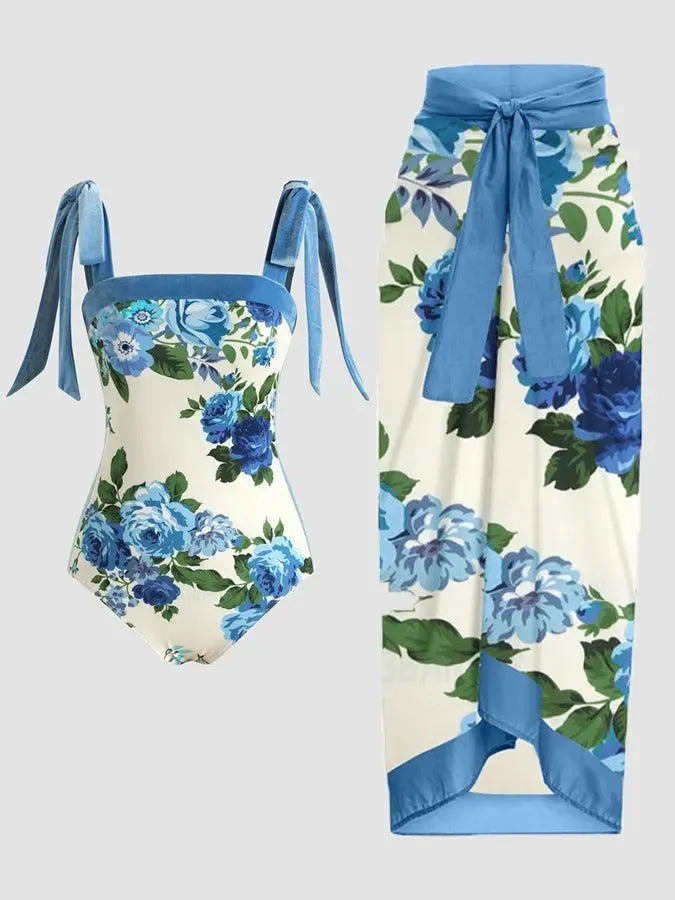 Women's two-piece floral printed polyester swimsuit with matching hip skirt in conservative style