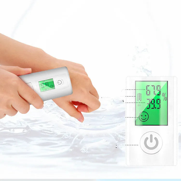 White rechargeable USB portable facial moisturiser spray 15cm by 4.5cm on a table