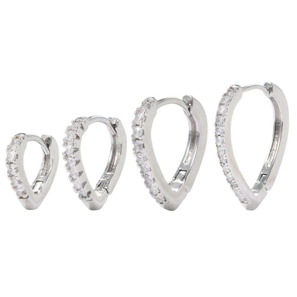 Gold geometric heart-shaped clip-on earring for women on a white background.