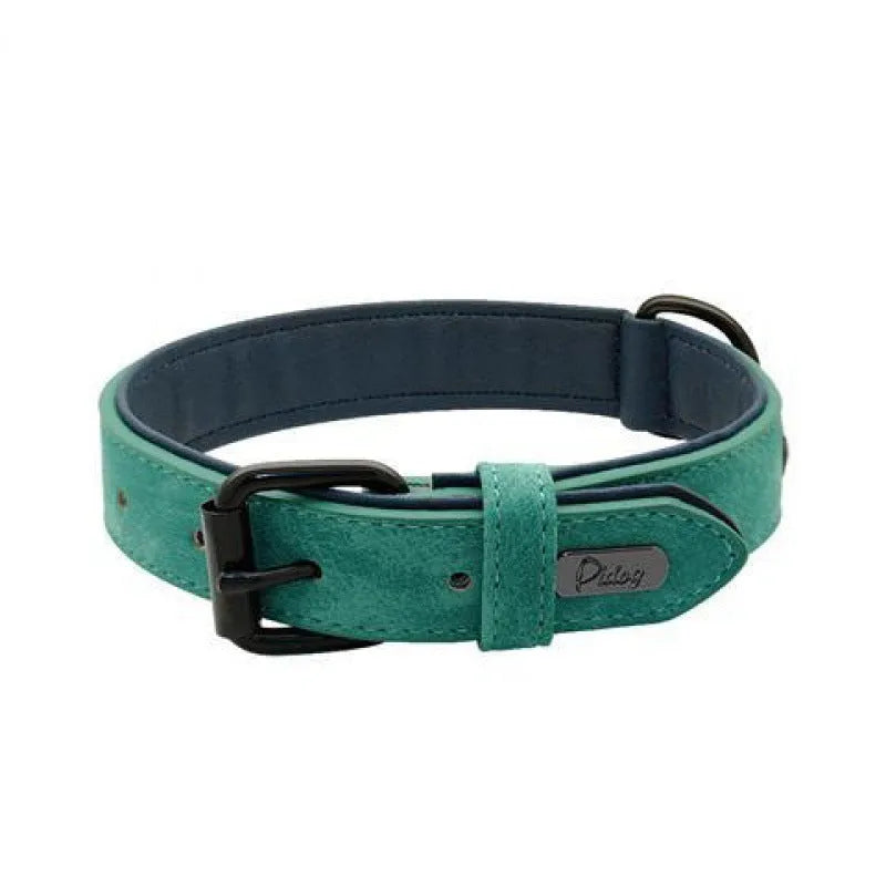 Adjustable dog collar in purple showing front PU material and back microfiber fabric, with a secure buckle closure.