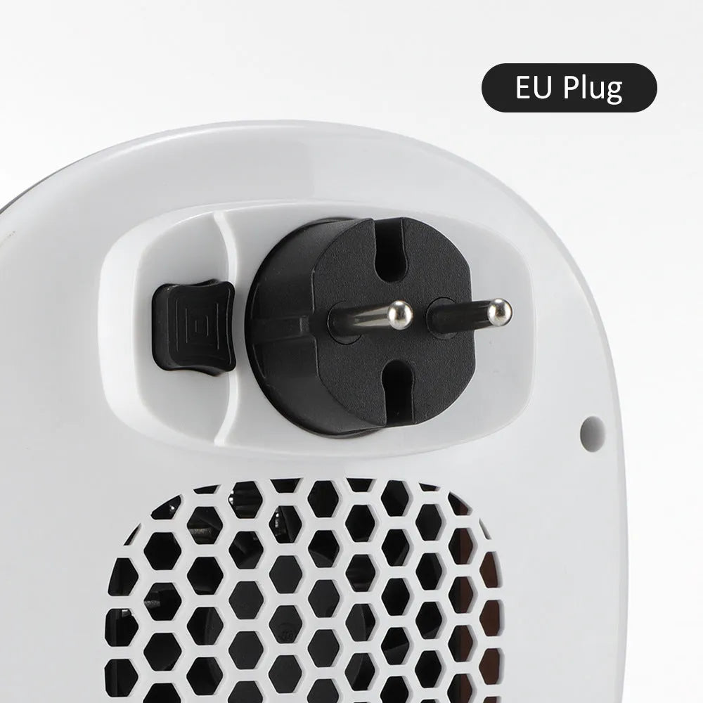 White ceramic electric hot air blower heater with remote control on table