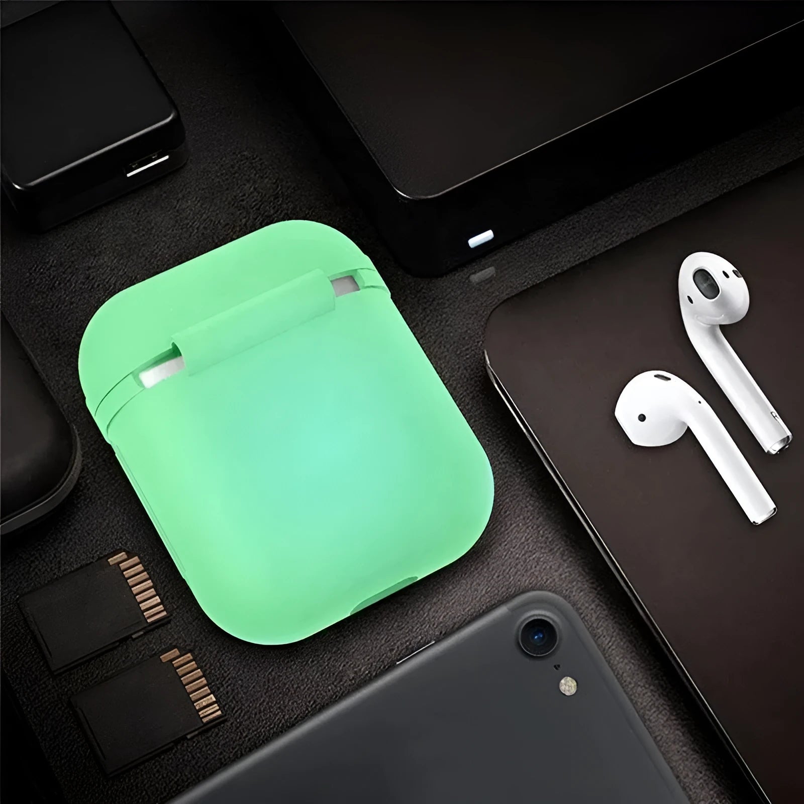 Luminous blue silicone flip-open protective case for Apple AirPods wireless earphones.