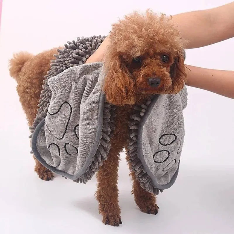 Blue pet bathrobe towel for drying dogs and cats, shown flat at 62cm by 23cm.