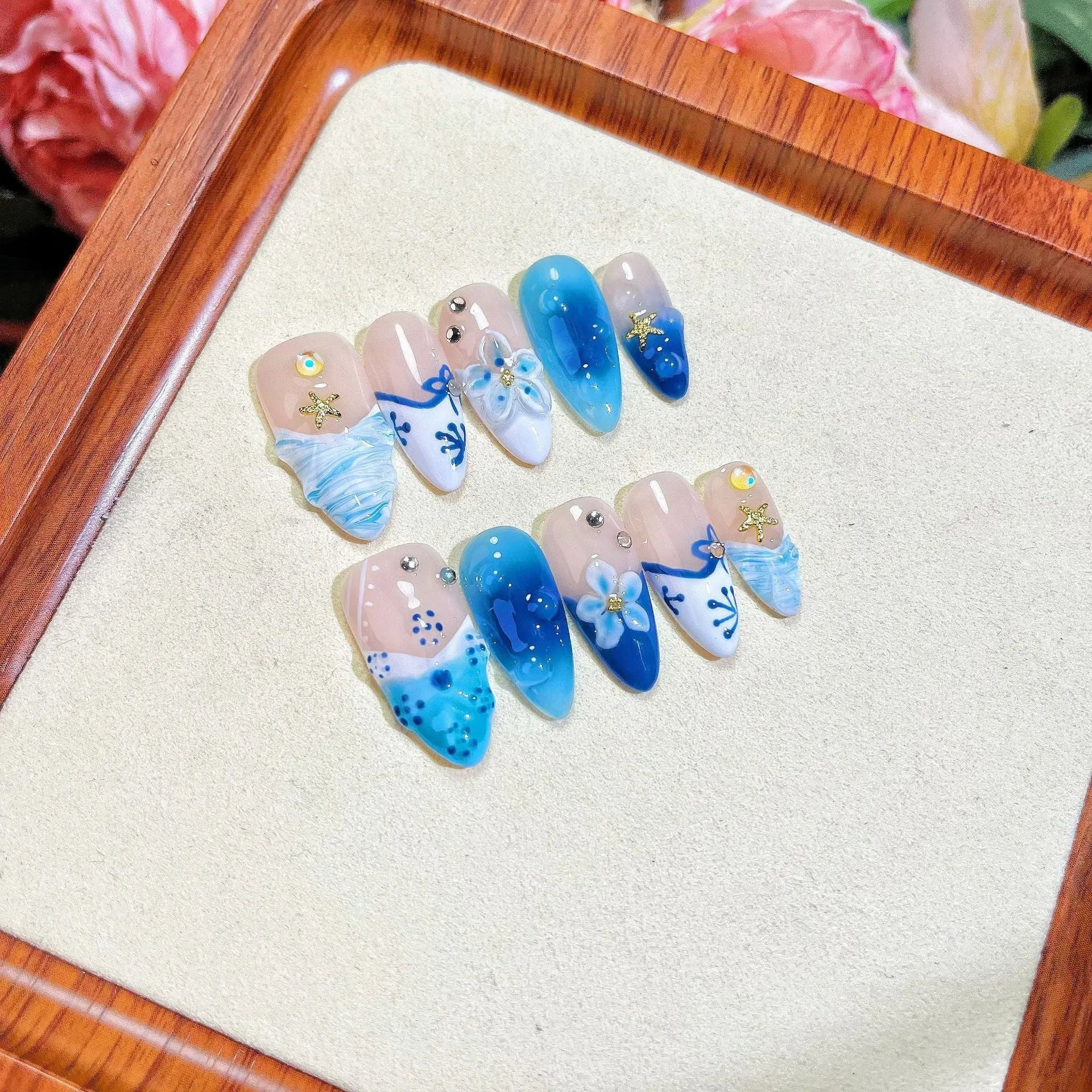 Blue hand-painted carved summer ice transparent fake nails set in plastic