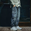 Men's blue loose straight leg retro stretch jeans with zip fly on mannequin