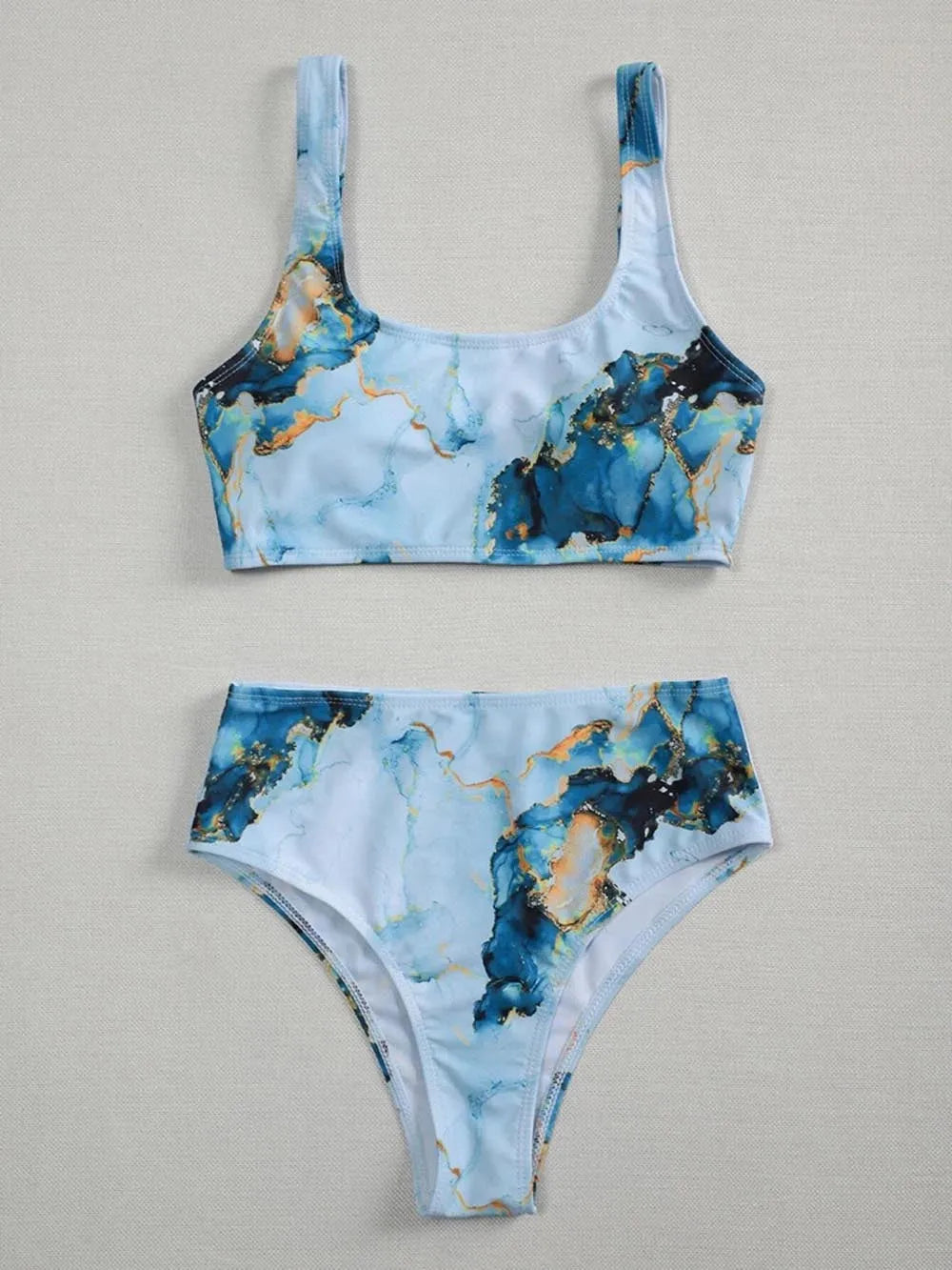 Women's high waist bikini swimsuit set with marble tie-dye print and U-neck design.