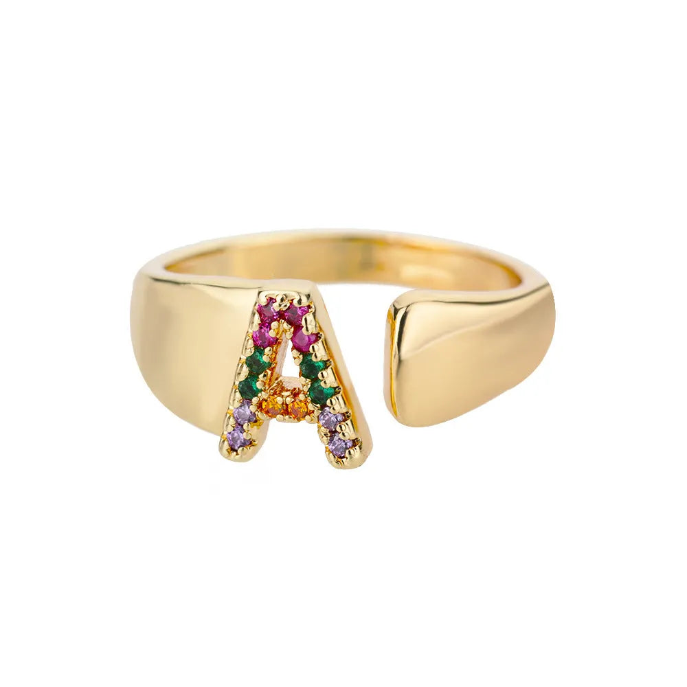 Fashion micro-set colored zirconium adjustable open ring showing letter A on a copper electroplated base