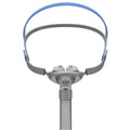 Ventilator nasal pillow mask accessory kit with silicone cushions and plastic headband.